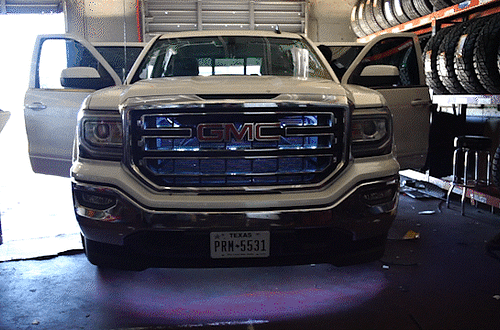 RGB accent lights installed on a GMC Sierra truck