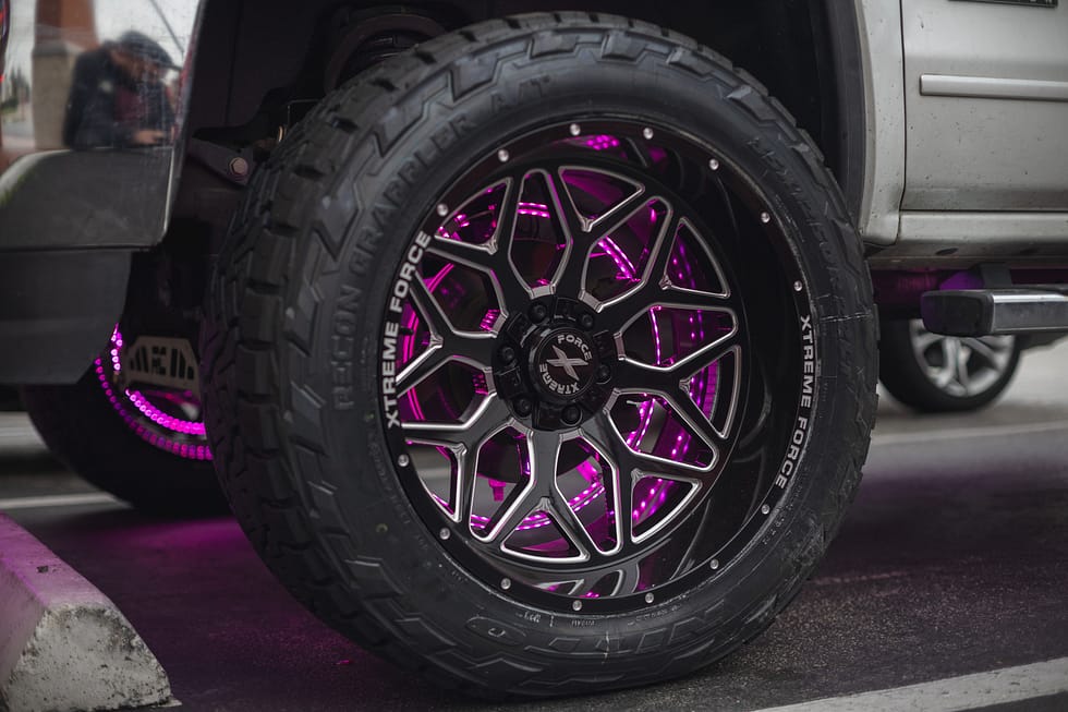 Off-road truck wheel with RGB lighting.